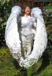 the 16' wings are wrapped around Debra at rest